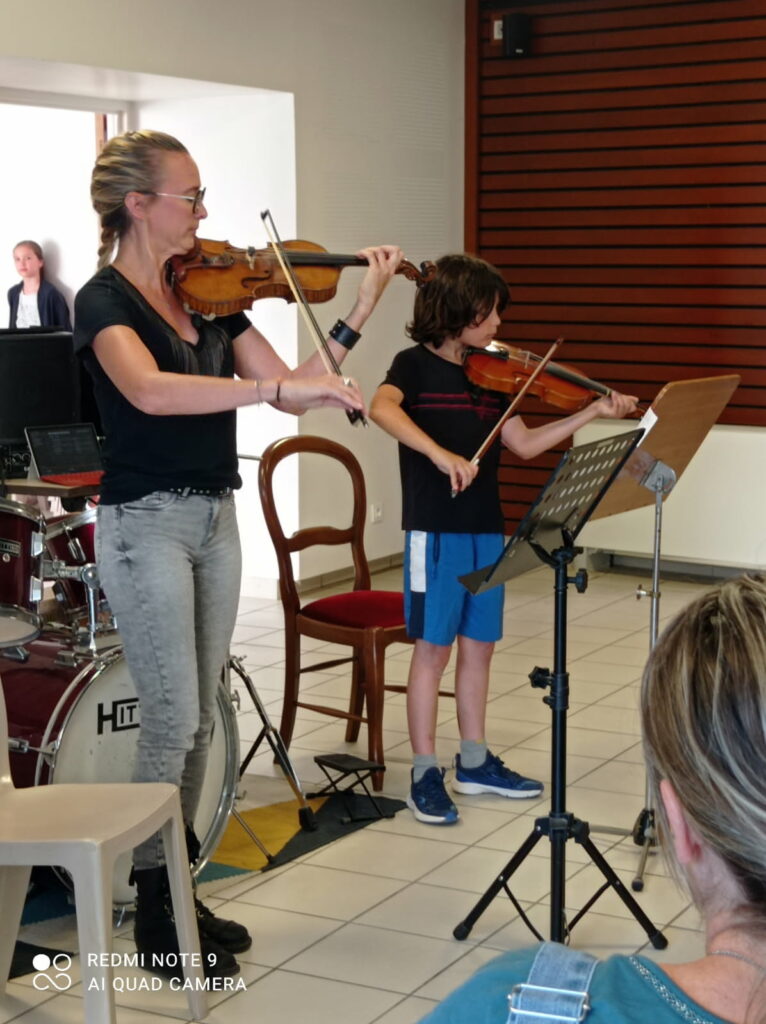 Audition de l'école de Musique de Mours Saint Eusèbe, Caroline et un élève